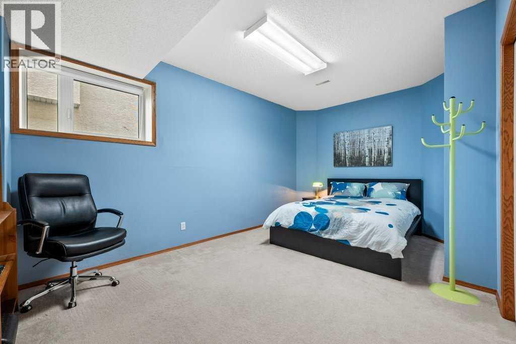 125 Woodpark Close SW, Calgary, Alberta  T2W 6H1 - Photo 36 - A2313625