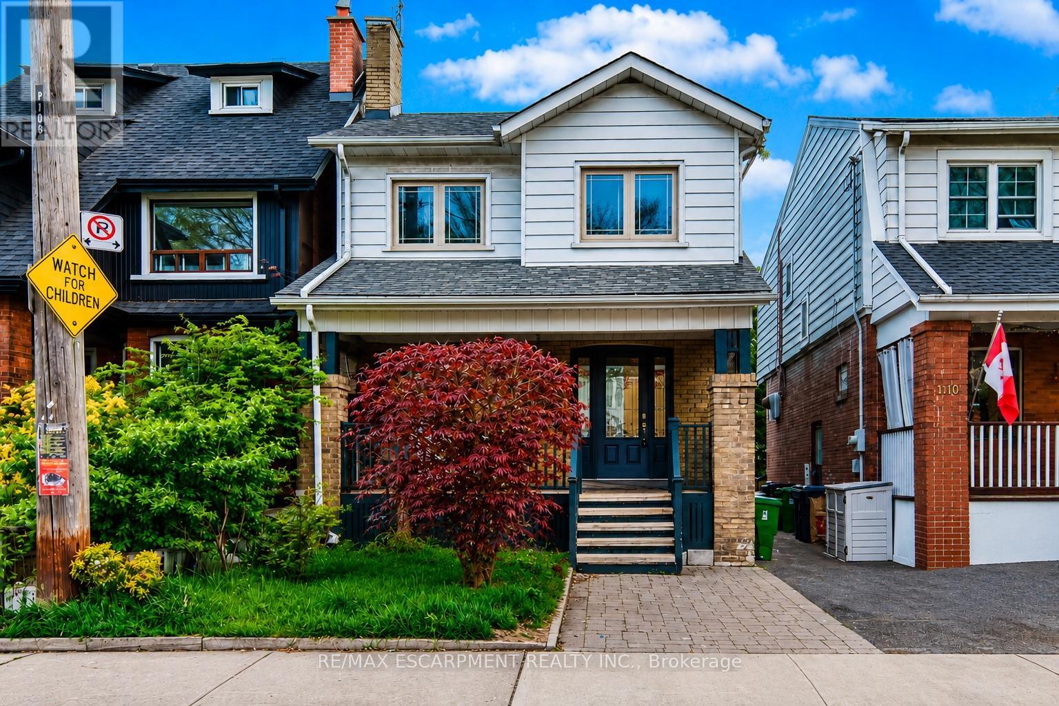 <div class="slider-price">$1,649,000</div><p>108 Runnymede Road, Toronto, Ontario</p>