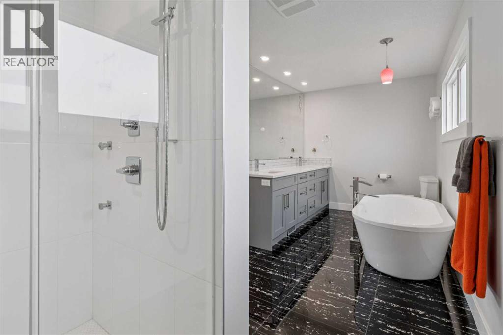 1303 105 Avenue SW, Calgary, Alberta  T2W 0B5 - Photo 20 - A2313272