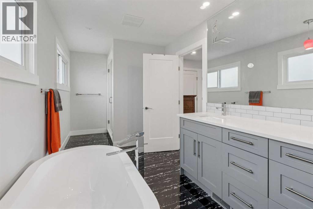 1303 105 Avenue SW, Calgary, Alberta  T2W 0B5 - Photo 21 - A2313272
