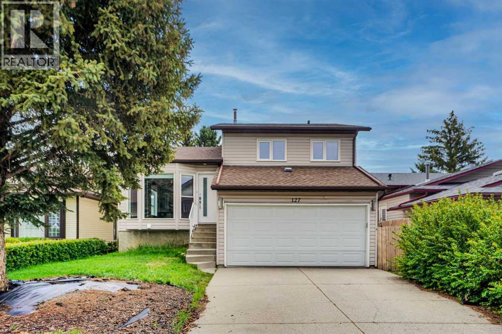 127 Woodstock Road SW, Calgary, Alberta  T2W 5W3 - Photo 2 - A2313153