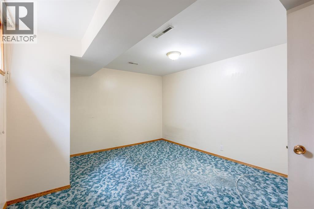 719 27 Avenue NW, Calgary, Alberta  T2M 2J4 - Photo 22 - A2309021