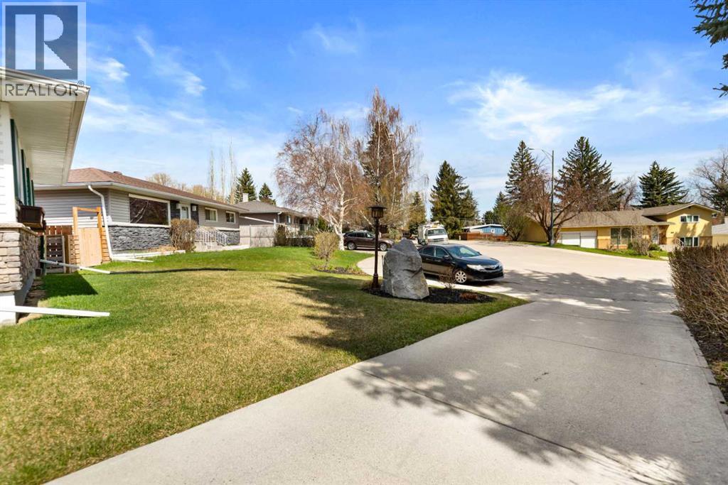 55 Kelvin Place SW, Calgary, Alberta  T2V 2L2 - Photo 4 - A2309252