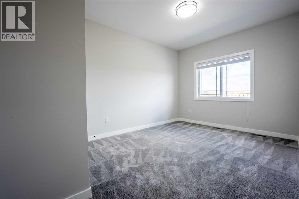 66 Baysprings Gardens SW, Airdrie, Alberta  T4B 5C6 - Photo 29 - A2307758
