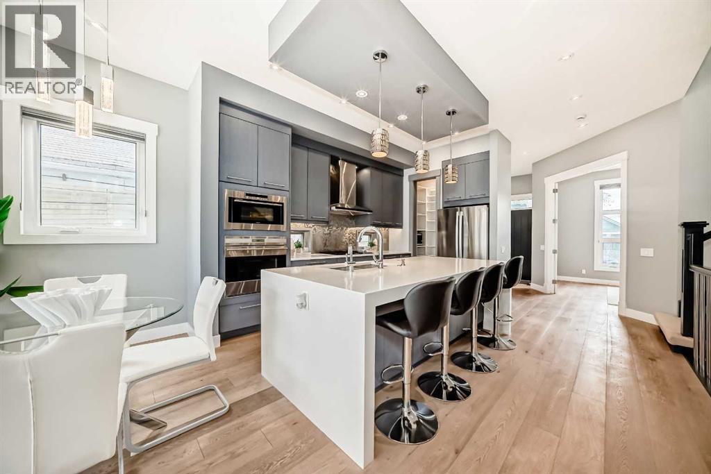1518 19 Avenue NW, Calgary, Alberta  T2M 1A8 - Photo 4 - A2311239