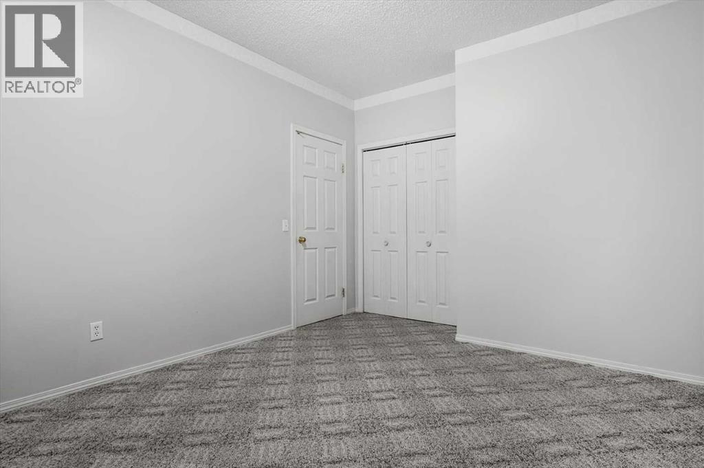 100 Macewan Park Manor NW, Calgary, Alberta  T3K 4G6 - Photo 34 - A2312914