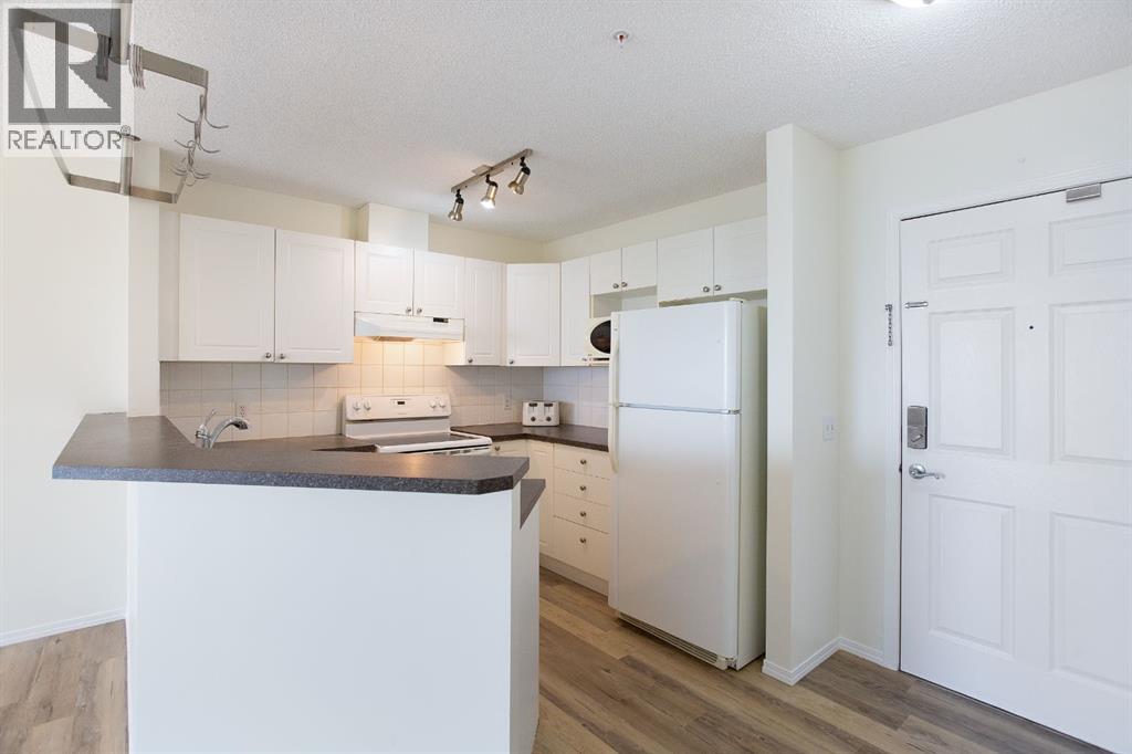 1205, 950 Arbour Lake Road NW, Calgary, Alberta  T3G 5B3 - Photo 3 - A2310465