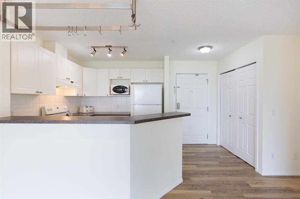 1205, 950 Arbour Lake Road NW, Calgary, Alberta  T3G 5B3 - Photo 7 - A2310465