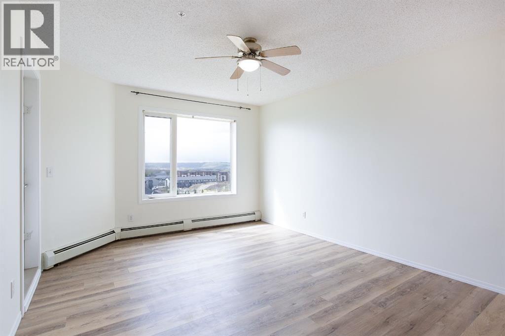 1205, 950 Arbour Lake Road NW, Calgary, Alberta  T3G 5B3 - Photo 11 - A2310465