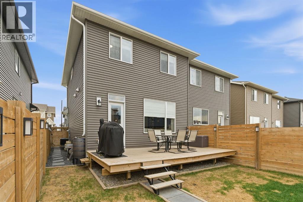 77 Wolf Gate, Okotoks, Alberta  T1S 5T9 - Photo 33 - A2311588