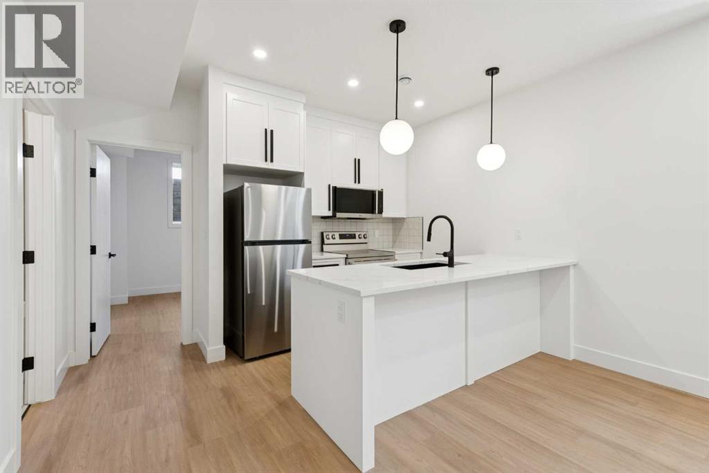 1027 32 Avenue Nw, Calgary, Alberta  T2K 0B2 - Photo 42 - A2311616