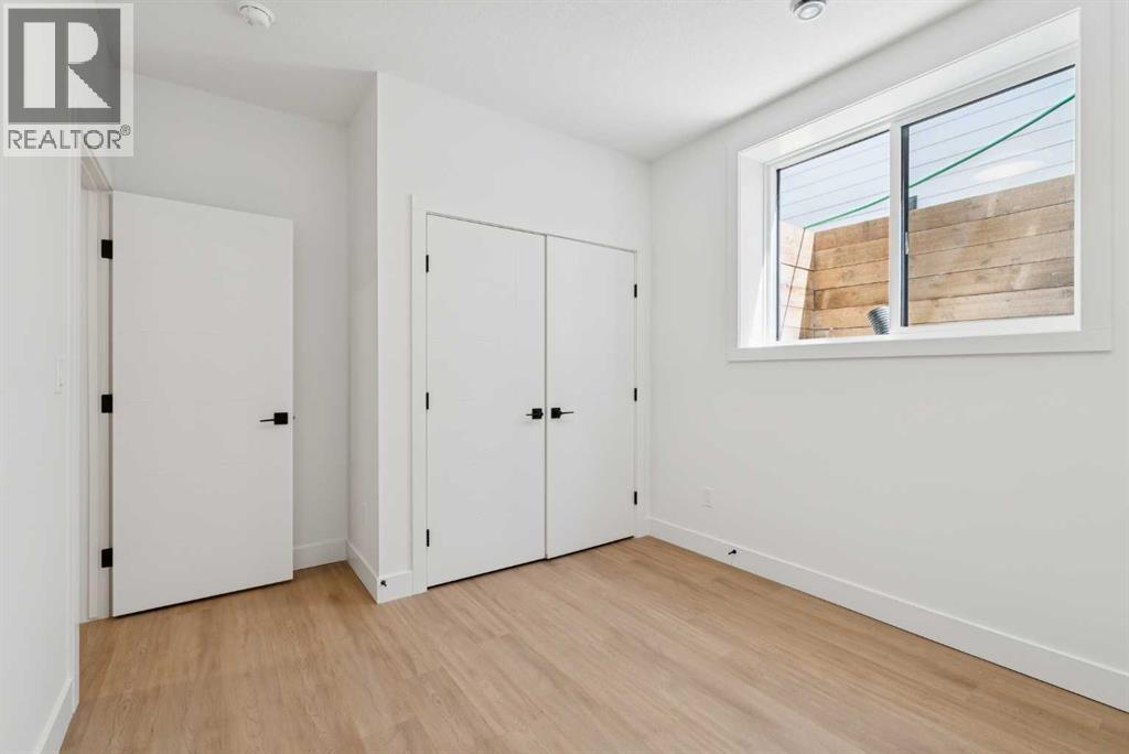 1027 32 Avenue Nw, Calgary, Alberta  T2K 0B2 - Photo 47 - A2311616