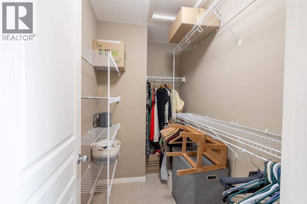 74 Valley Crest Rise NW, Calgary, Alberta  T3B 5Y9 - Photo 19 - A2305954
