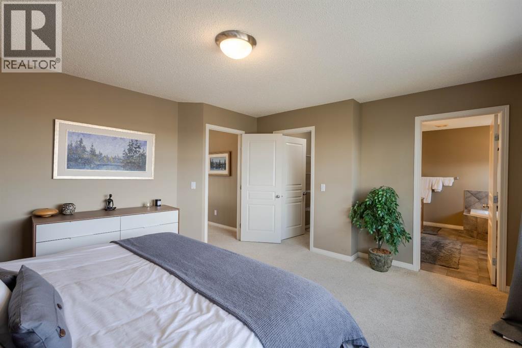 74 Valley Crest Rise NW, Calgary, Alberta  T3B 5Y9 - Photo 18 - A2305954