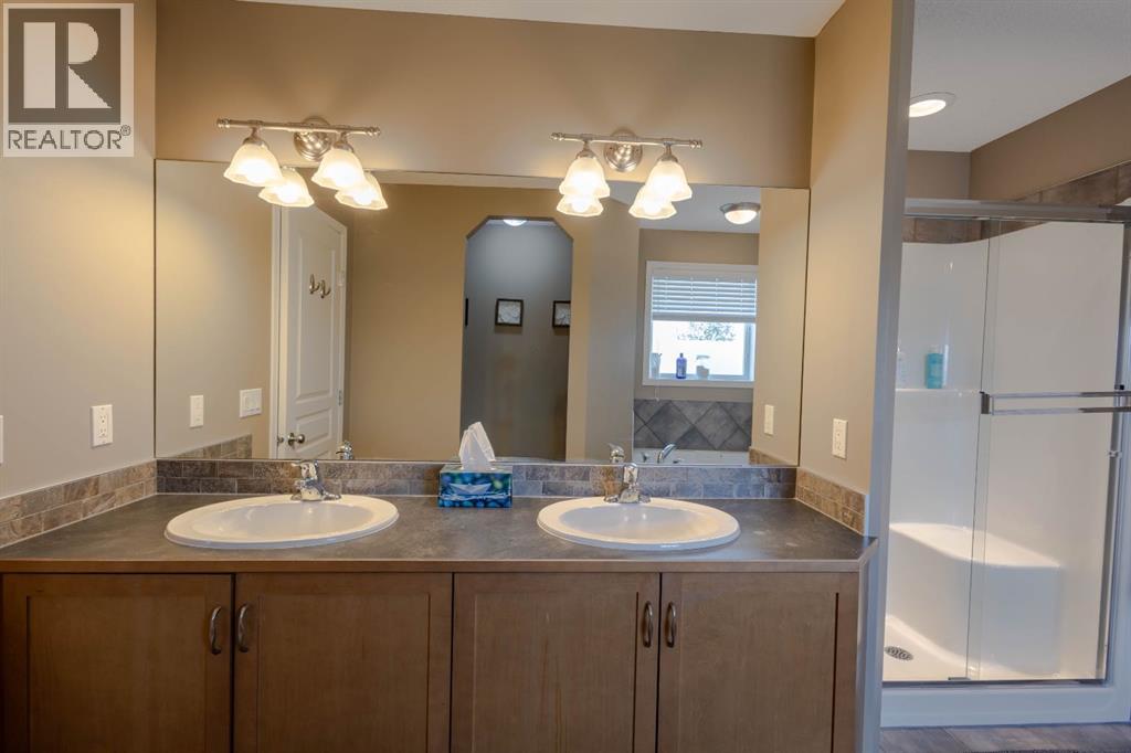 74 Valley Crest Rise NW, Calgary, Alberta  T3B 5Y9 - Photo 21 - A2305954