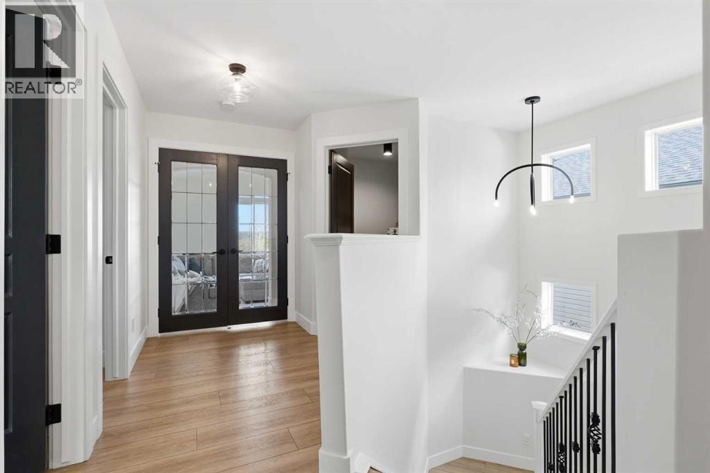 15 Valley Stream Manor NW, Calgary, Alberta  T3B 5V9 - Photo 29 - A2307956