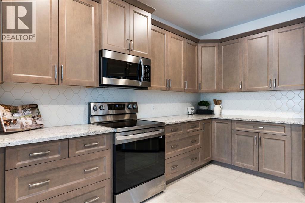 99 Ridge View Close, Cochrane, Alberta  T4C 0P8 - Photo 6 - A2313785