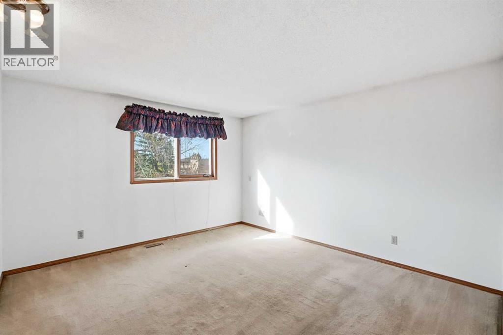 108 Santana Court NW, Calgary, Alberta  T3K 3B1 - Photo 22 - A2313323