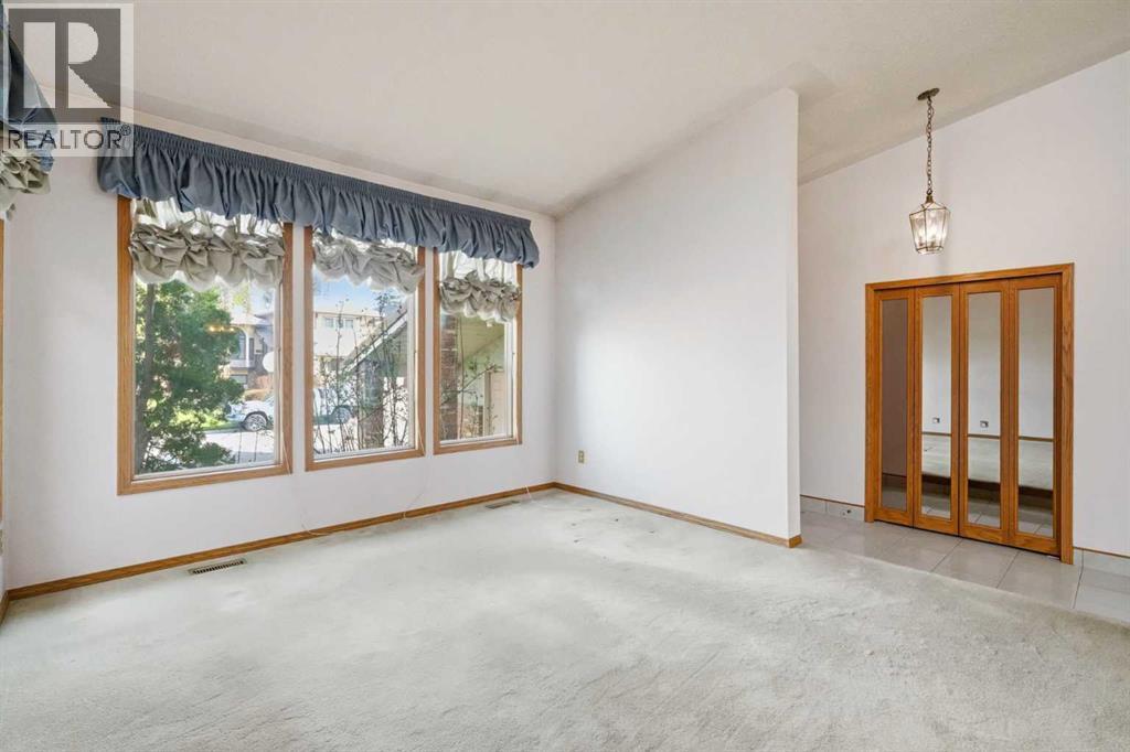 108 Santana Court NW, Calgary, Alberta  T3K 3B1 - Photo 5 - A2313323