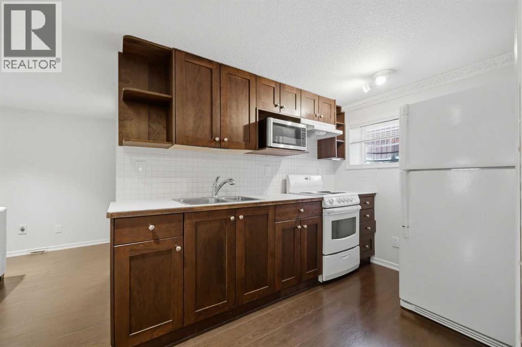 118 Frontenac Avenue NW, Diamond Valley, Alberta  T0L 2A0 - Photo 33 - A2312562