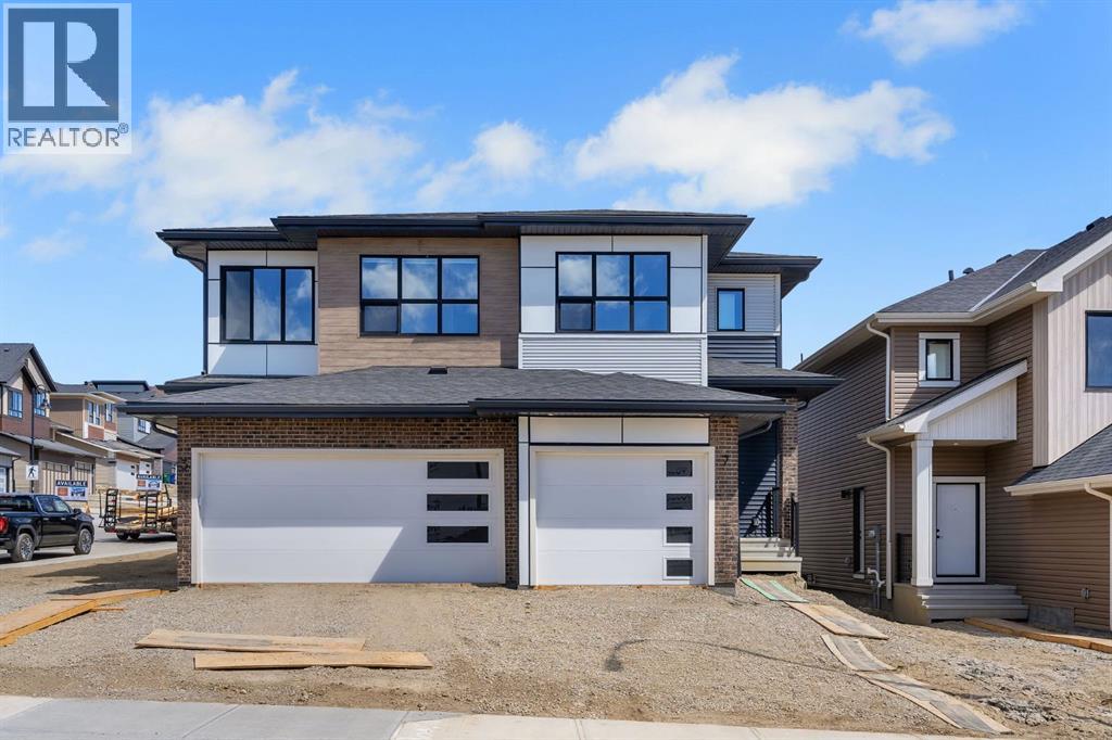 7 Heritage Heath, Cochrane, Alberta  T4C 3K8 - Photo 3 - A2310847