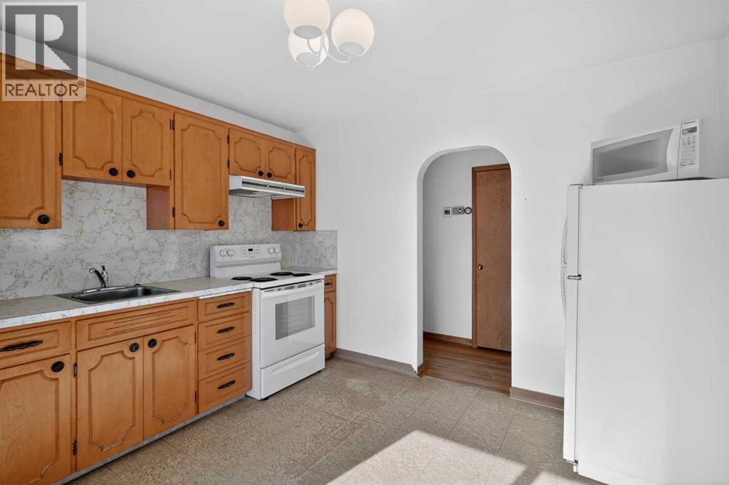 2416 38 Street SW, Calgary, Alberta  T3E 3E5 - Photo 11 - A2306341