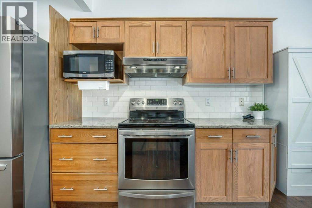 128 Sunterra Heights, Cochrane, Alberta  T4C 1W7 - Photo 13 - A2313862