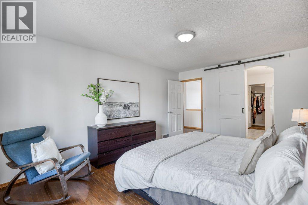 128 Sunterra Heights, Cochrane, Alberta  T4C 1W7 - Photo 23 - A2313862
