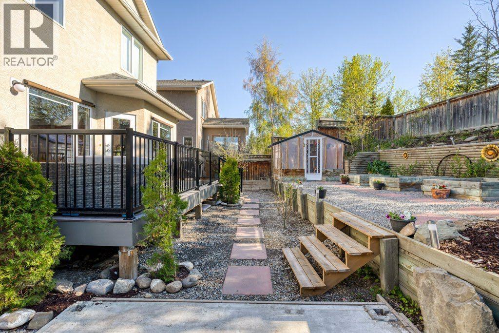 128 Sunterra Heights, Cochrane, Alberta  T4C 1W7 - Photo 42 - A2313862