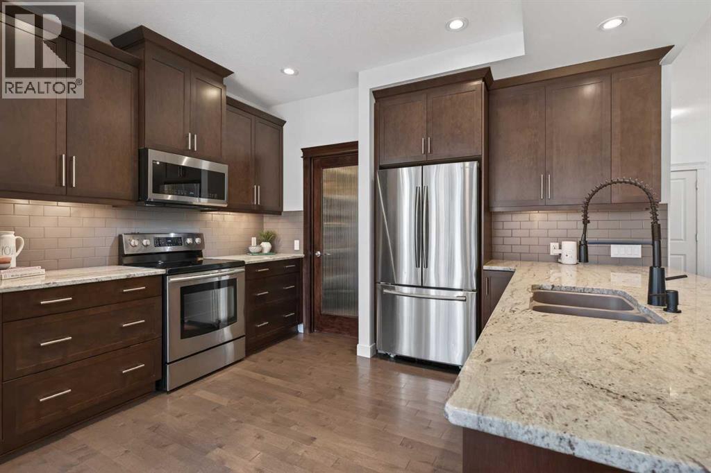 131 Ravenscroft Close SE, Airdrie, Alberta  T4A 0M1 - Photo 6 - A2303616