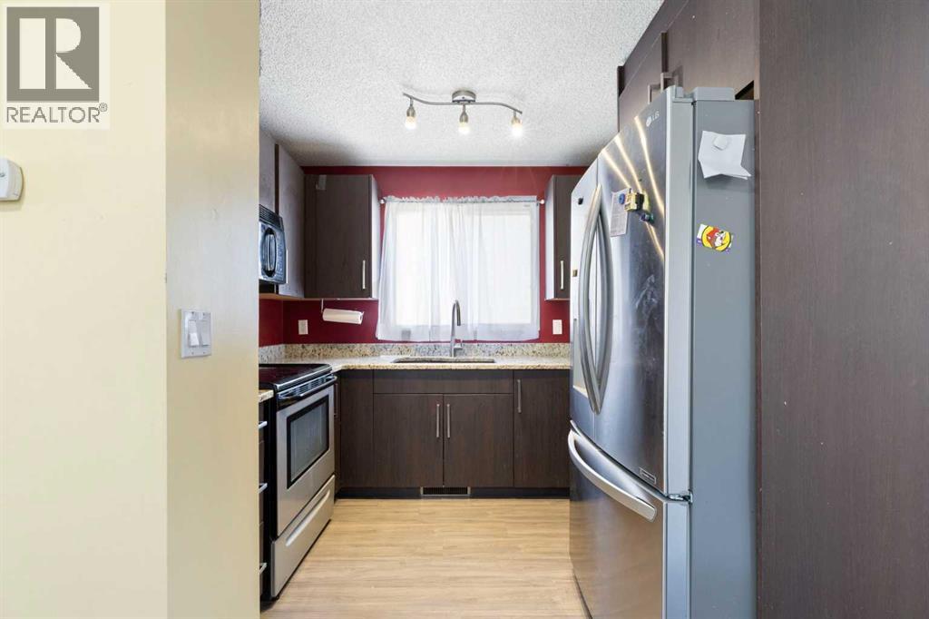 21 Mckernan Road SE, Calgary, Alberta  T2Z 1S7 - Photo 12 - A2309974