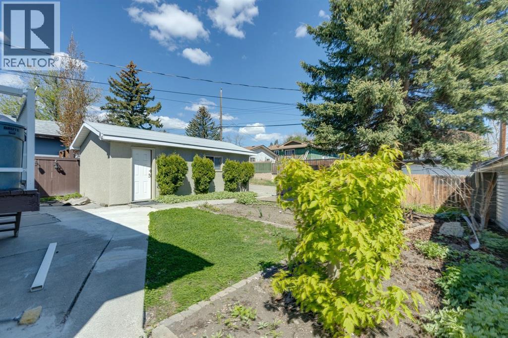 6928 Hunterbow Crescent NW, Calgary, Alberta  T2K 4R5 - Photo 30 - A2313807
