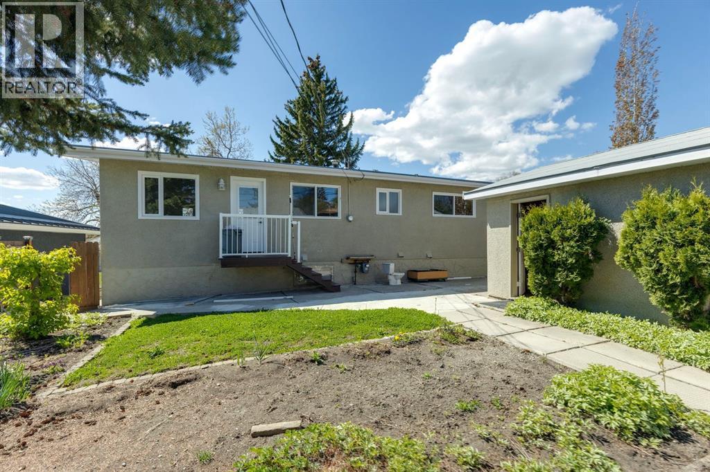 6928 Hunterbow Crescent NW, Calgary, Alberta  T2K 4R5 - Photo 32 - A2313807