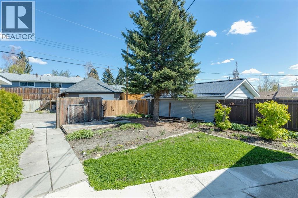 6928 Hunterbow Crescent NW, Calgary, Alberta  T2K 4R5 - Photo 33 - A2313807