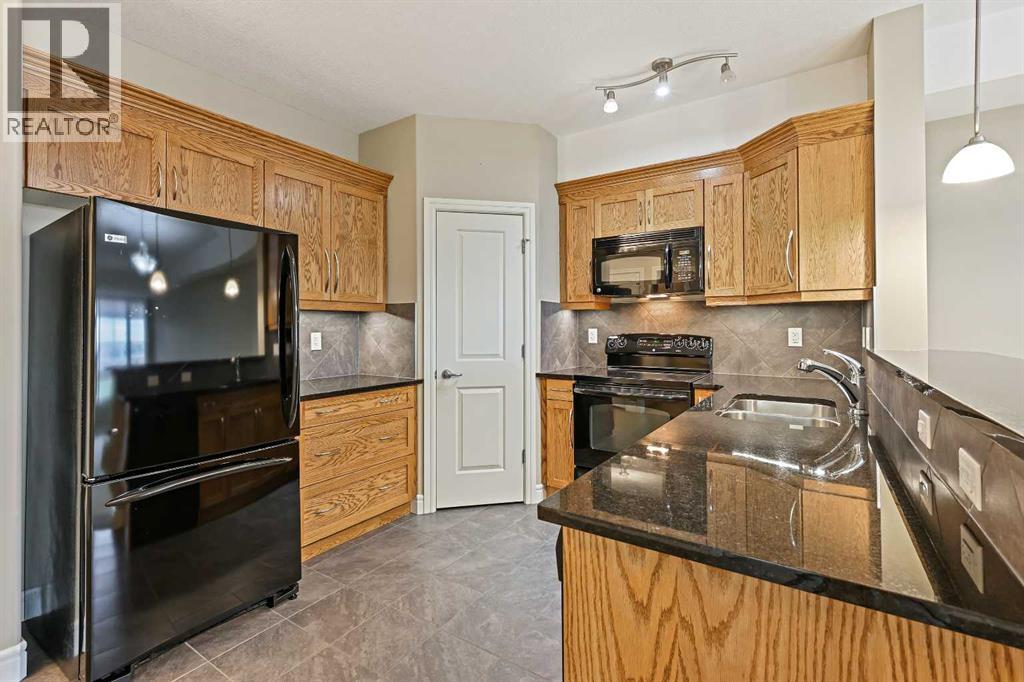 1243, 2330 Fish Creek Boulevard SW, Calgary, Alberta  T2Y 0L1 - Photo 3 - A2311370