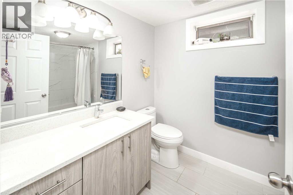 180 Woodglen Way SW, Calgary, Alberta  T2W 4T3 - Photo 27 - A2312843