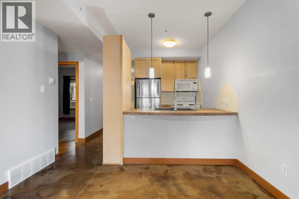 110, 1235 13 Avenue SW, Calgary, Alberta  T3C 0T2 - Photo 4 - A2312153