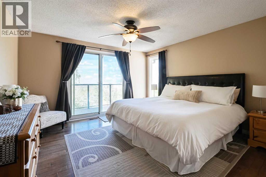 44 Coach Manor Rise SW, Calgary, Alberta  T3H 1C4 - Photo 10 - A2313362
