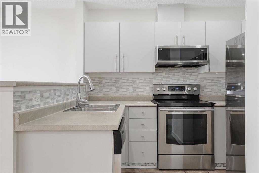 204, 760 Railway Gate SW, Airdrie, Alberta  T4B 3C5 - Photo 13 - A2313705