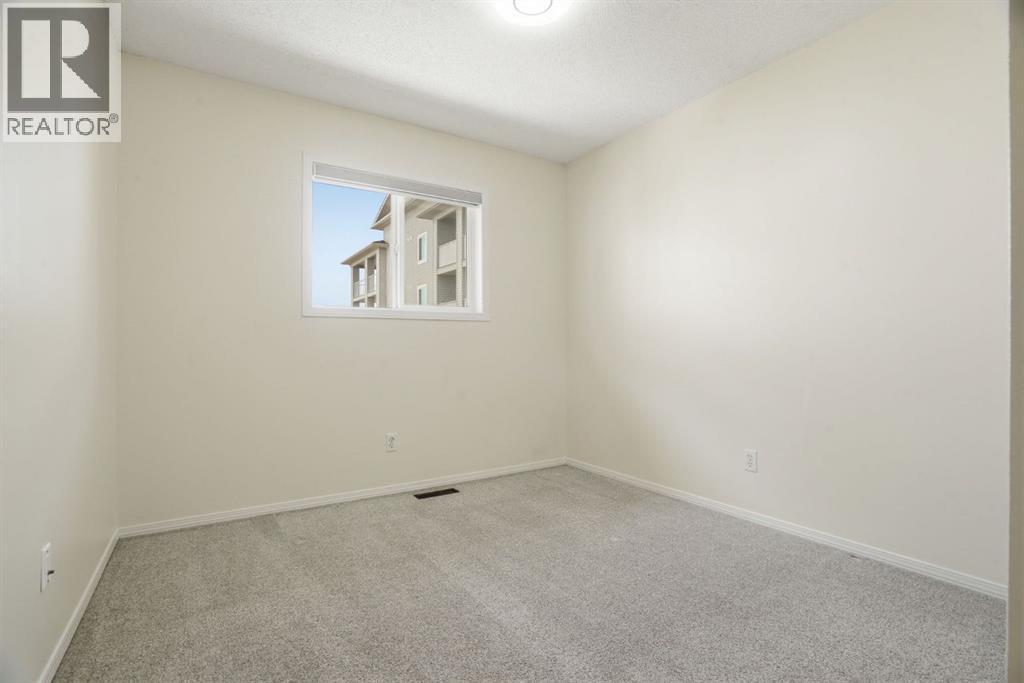 204, 760 Railway Gate SW, Airdrie, Alberta  T4B 3C5 - Photo 26 - A2313705
