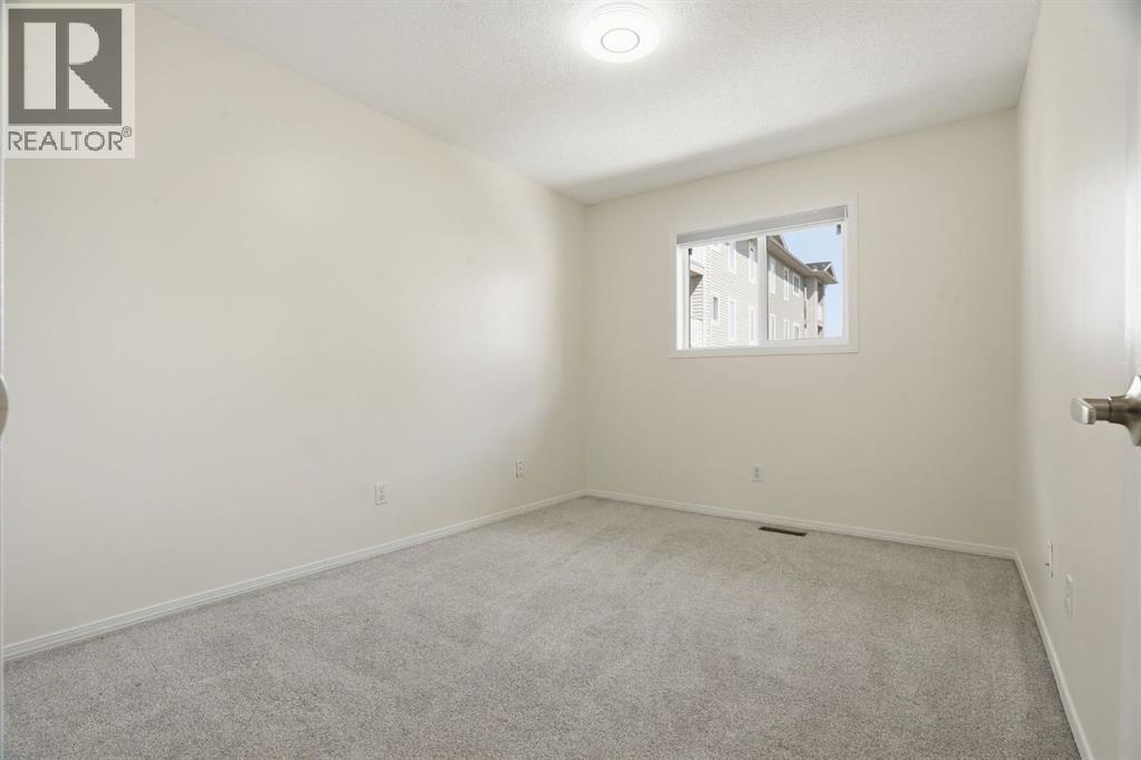 204, 760 Railway Gate SW, Airdrie, Alberta  T4B 3C5 - Photo 29 - A2313705