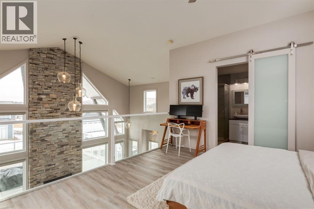 406 Cottageclub Cove, Rural Rocky View County, Alberta  T4C 1B1 - Photo 28 - A2297871