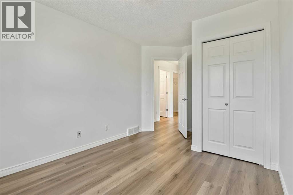 14 Crystal Shores Hill, Okotoks, Alberta  T1S 2H7 - Photo 24 - A2311680