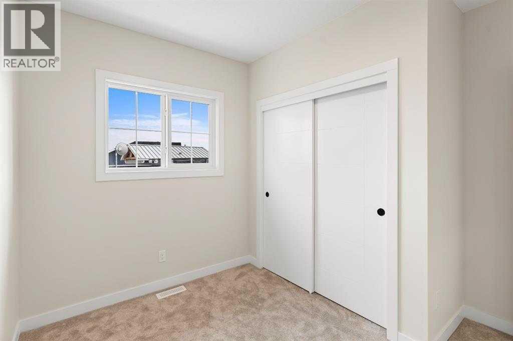32 Cottageclub Lane, Rural Rocky View County, Alberta  T4C 1B1 - Photo 24 - A2311140