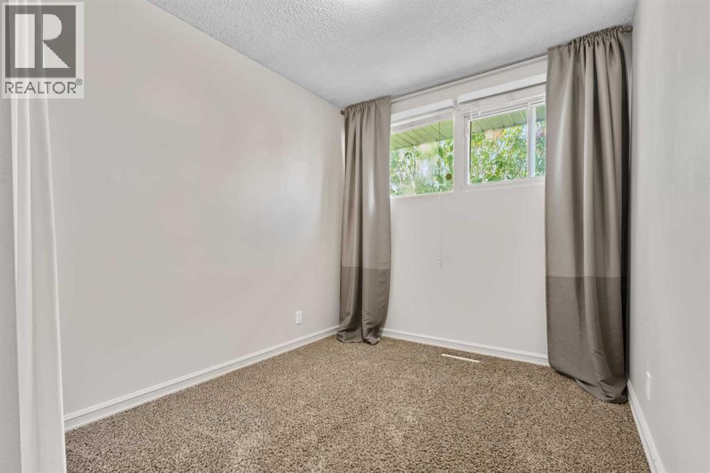 2420 Langriville Drive SW, Calgary, Alberta  T3E 5G8 - Photo 20 - A2312635