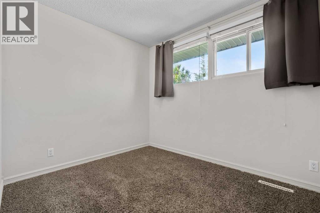 2420 Langriville Drive SW, Calgary, Alberta  T3E 5G8 - Photo 22 - A2312635