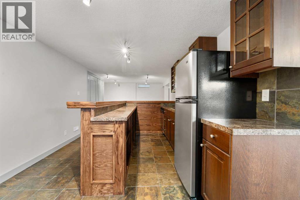 2420 Langriville Drive SW, Calgary, Alberta  T3E 5G8 - Photo 26 - A2312635