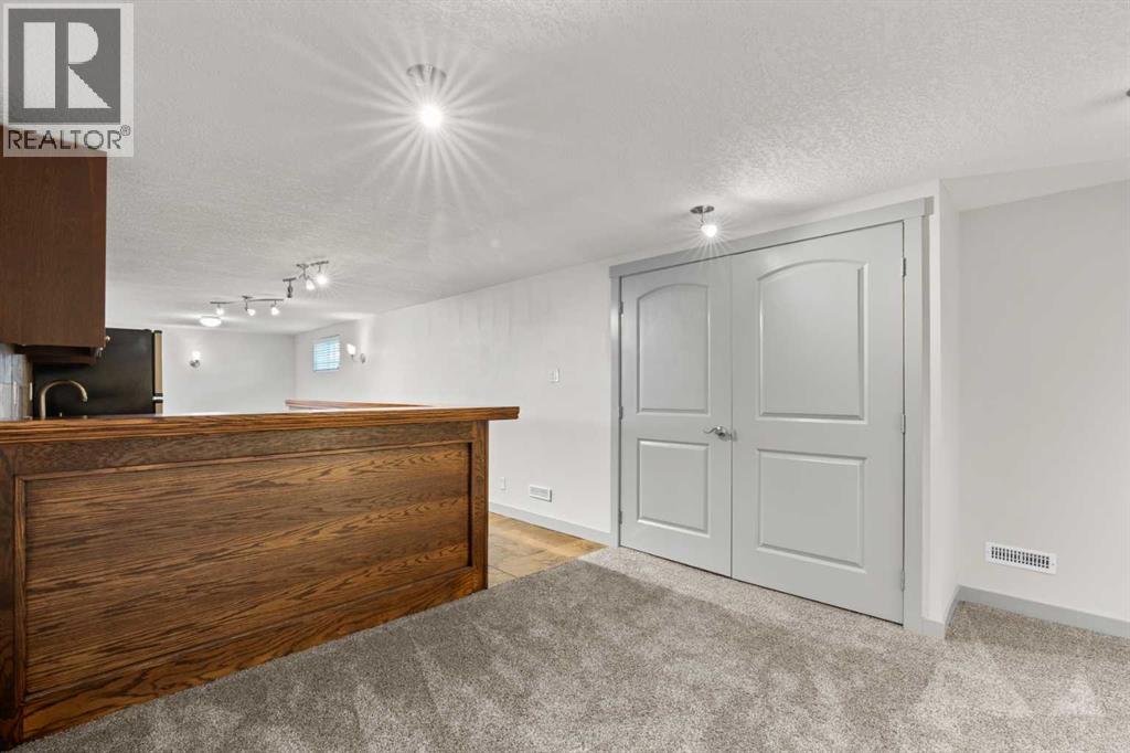 2420 Langriville Drive SW, Calgary, Alberta  T3E 5G8 - Photo 28 - A2312635