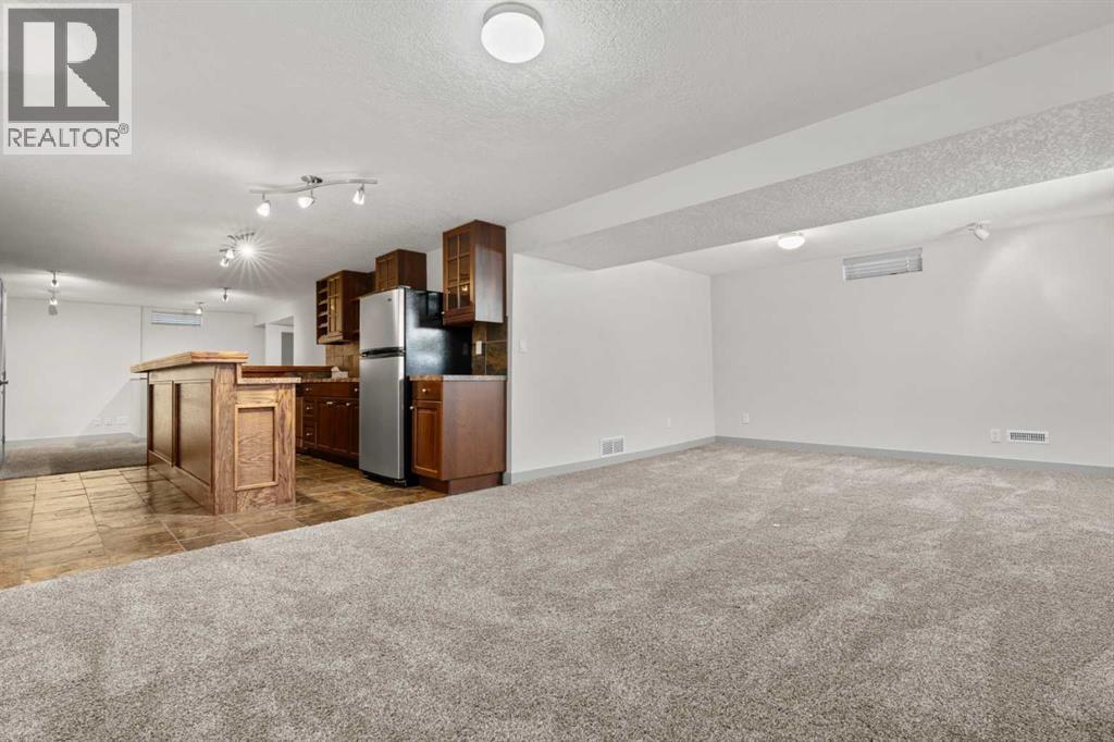 2420 Langriville Drive SW, Calgary, Alberta  T3E 5G8 - Photo 29 - A2312635