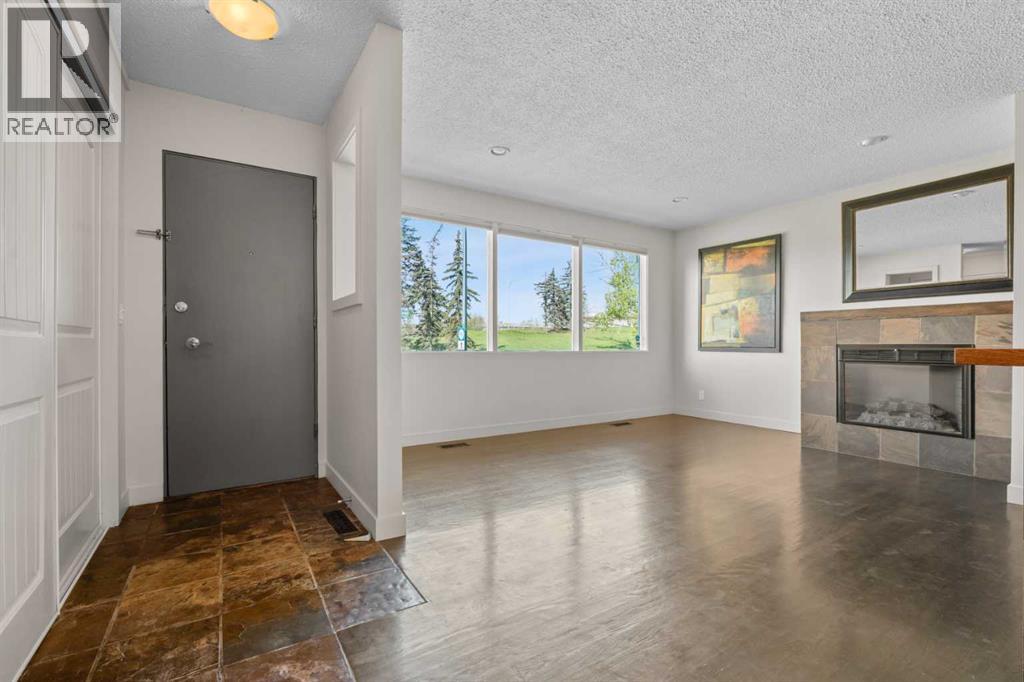 2420 Langriville Drive SW, Calgary, Alberta  T3E 5G8 - Photo 4 - A2312635